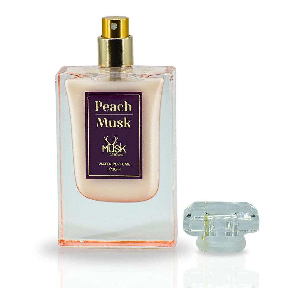 Hamidi Peach Musk Water Perfume spray 30ml bottle with elegant design and enchanting aroma, ideal for fresh, floral fragrance.