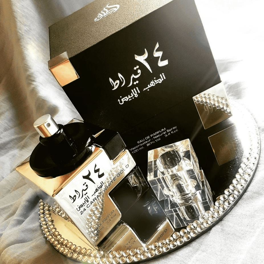 Lattafa 24 Carat White Gold Eau De Parfum 100ml bottle with elegant white packaging and gold accents