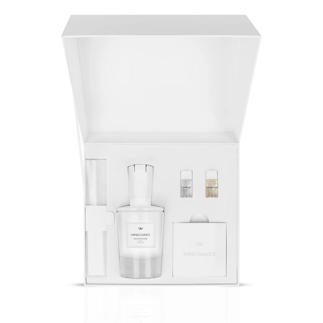 Queenside Extrait de Parfum by Mind Games in a 100ml glass bottle, featuring elegant packaging and a sleek design.