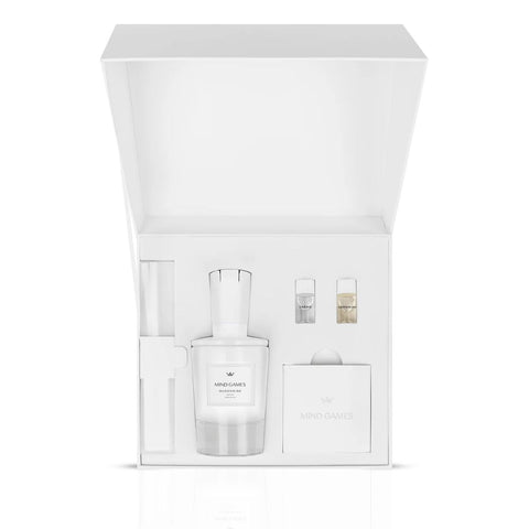 Queenside Extrait de Parfum by Mind Games in a 100ml glass bottle, featuring elegant packaging and a sleek design.
