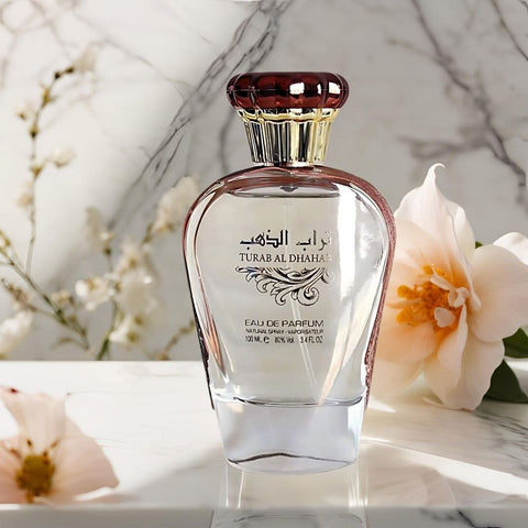 Bundle of Ard Al Zaafaran Turab Al Dhabab and Turab Al Dhahab rose Eau de Parfum sprays, 100ml bottles.