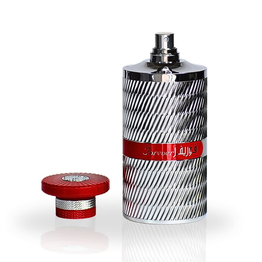 Forever Silver Eau de Parfum Spray by Ard Al Zaafaran, 100ml, with a velvet pouch, featuring an elegant perfume bottle.