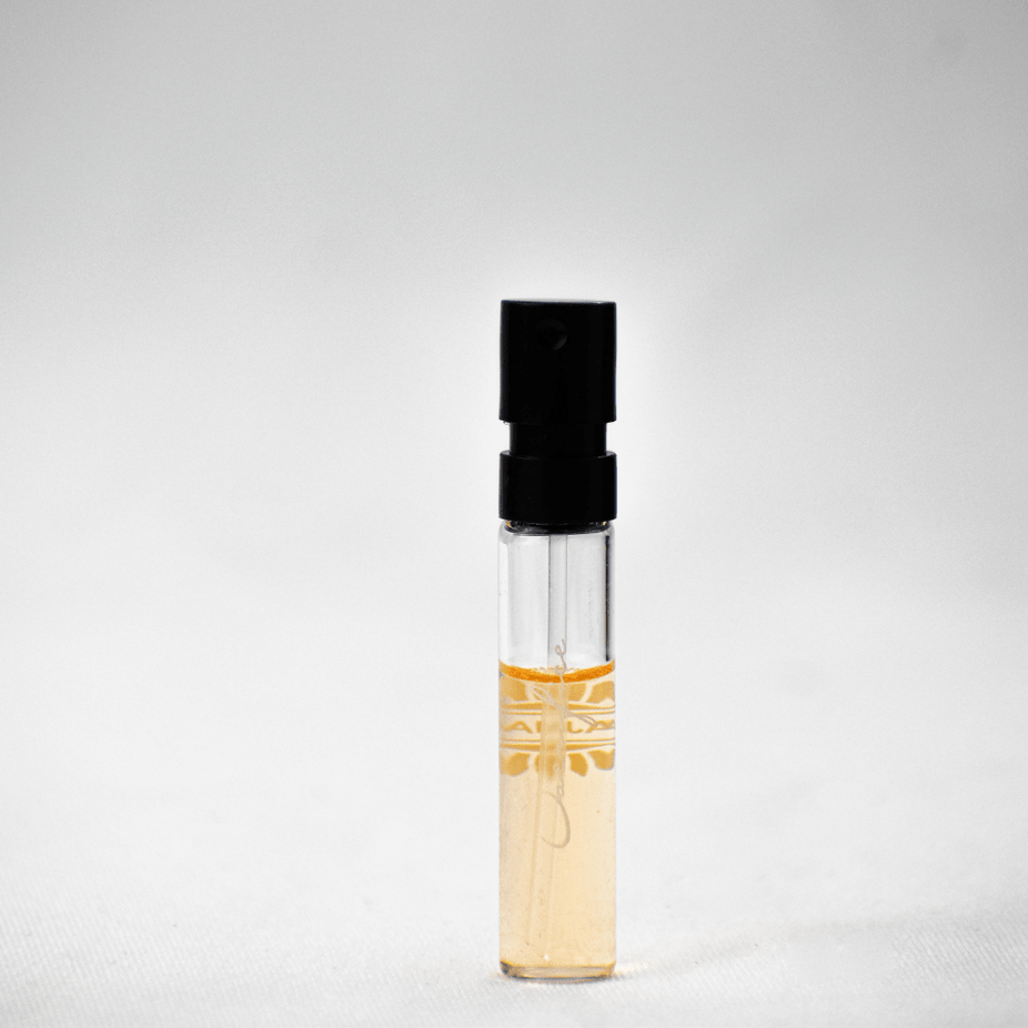Ajmal Sacrifice EDP sample for women, 1ML fragrance vial with elegant packaging, ideal for testing the floral and oriental scent.