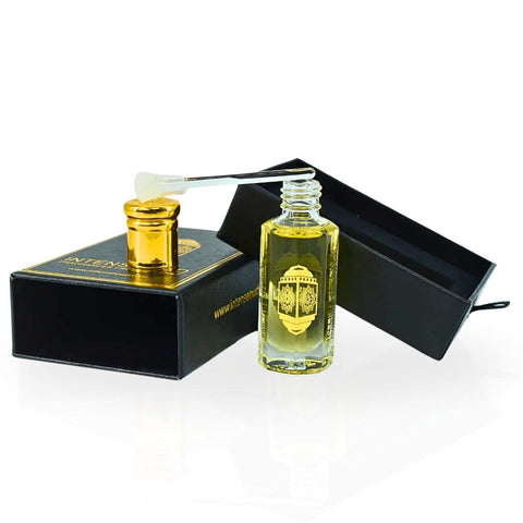 Intense Oud Scandalous perfume oil in a 12ml black gift box, featuring a luxurious loose oil bottle with elegant packaging.