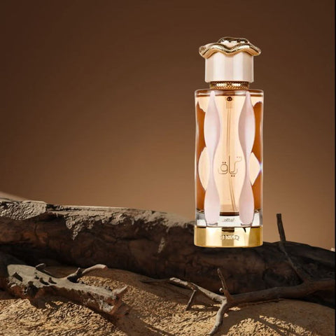 Lattafa Khamrah & Teriaq Eau de Parfum spray bundle, 100ml, featuring two elegant perfume bottles with intricate designs.