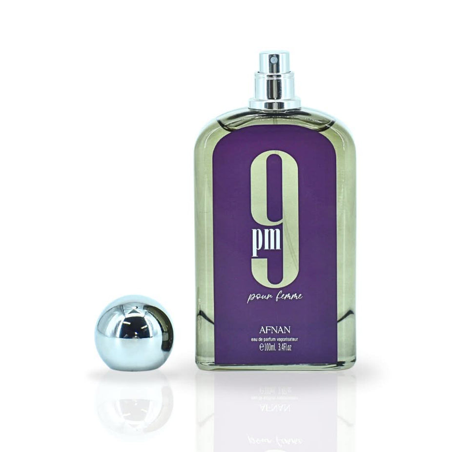 Afnan 9PM Pour Femme Eau de Parfum spray bottle with 100ml capacity, sleek design, and floral fragrance details visible.