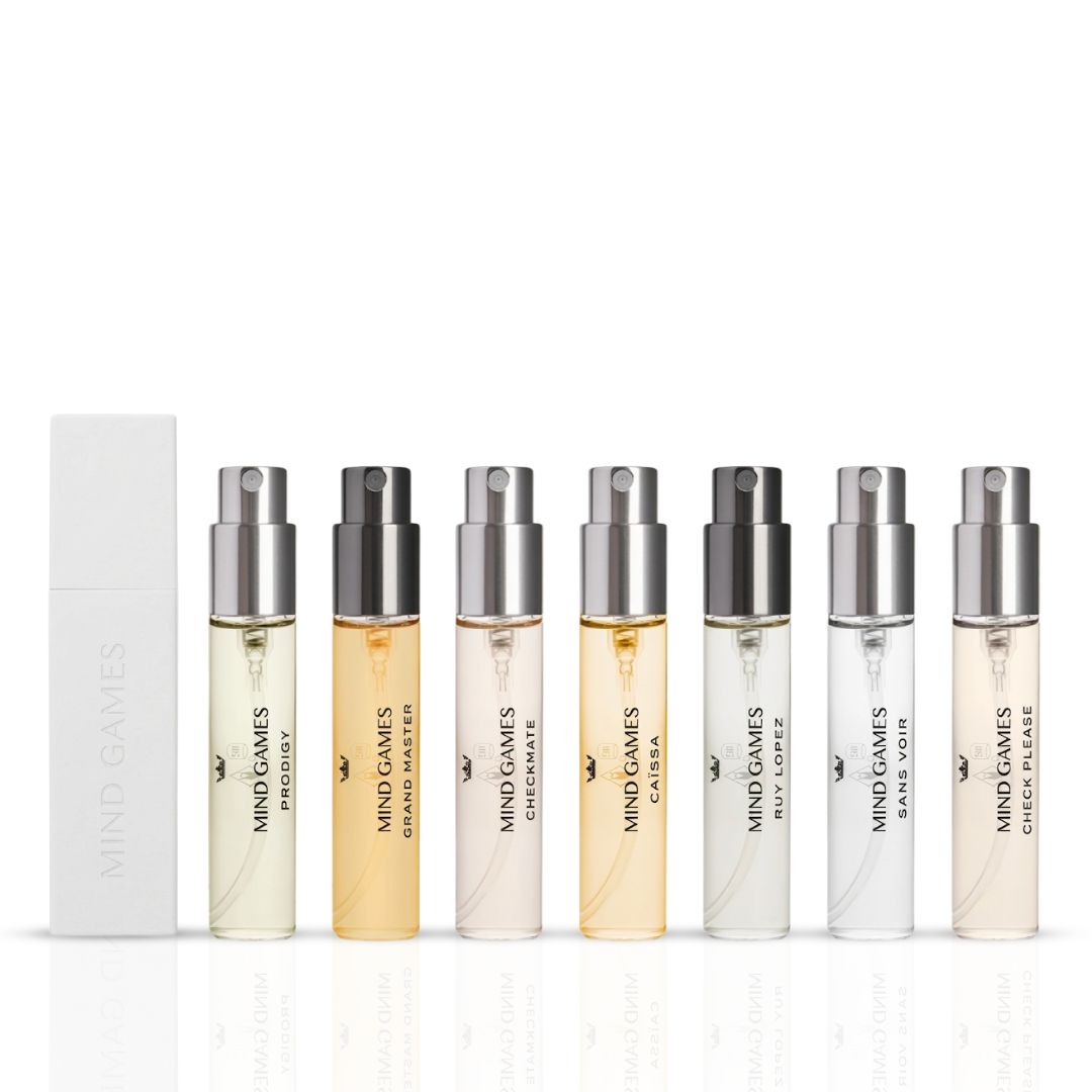 Mind Games Olfactive Floral 7-piece discovery set with seven 7.5ml fragrance bottles arranged in a display.