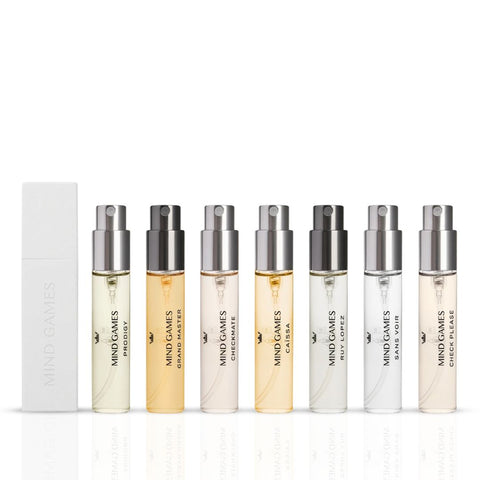 Mind Games Olfactive Floral 7-piece discovery set with seven 7.5ml fragrance bottles arranged in a display.