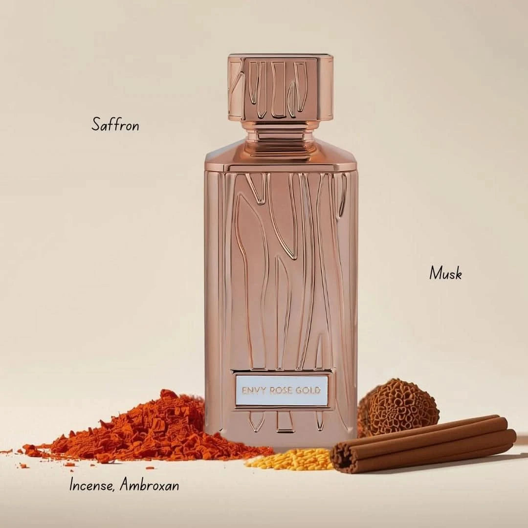 Hamidi Envy Rose Gold Eau de Parfum spray in 100ml bottle with velvet pouch, featuring a luxurious rose gold finish and elegant design.