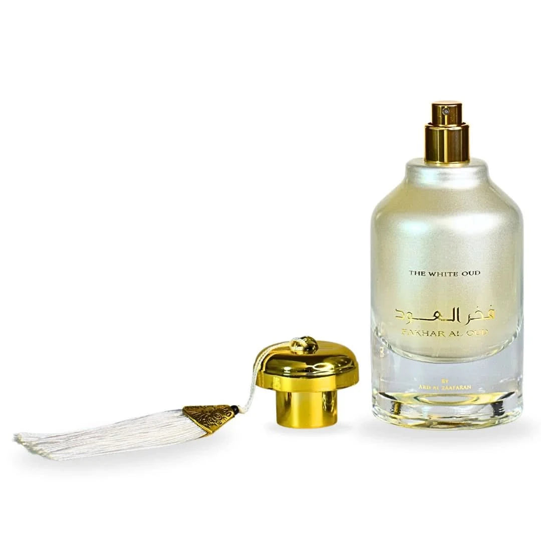 Fakhar Al Oud The White Oud EDP spray by Ard Al Zaafaran, 100ml, with velvet pouch, featuring elegant perfume bottle and packaging