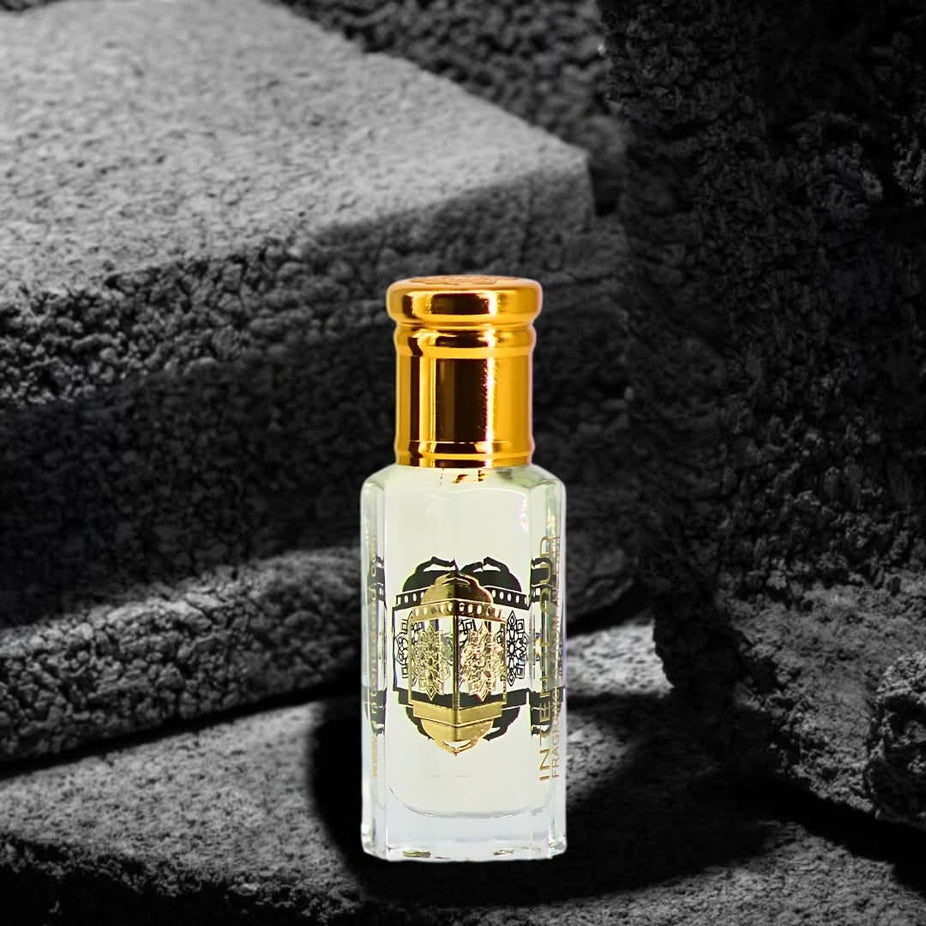Intense Oud Cool Bleu men's perfume oil with black gift box, 12ml loose oil bottle featuring sleek packaging and dark label.