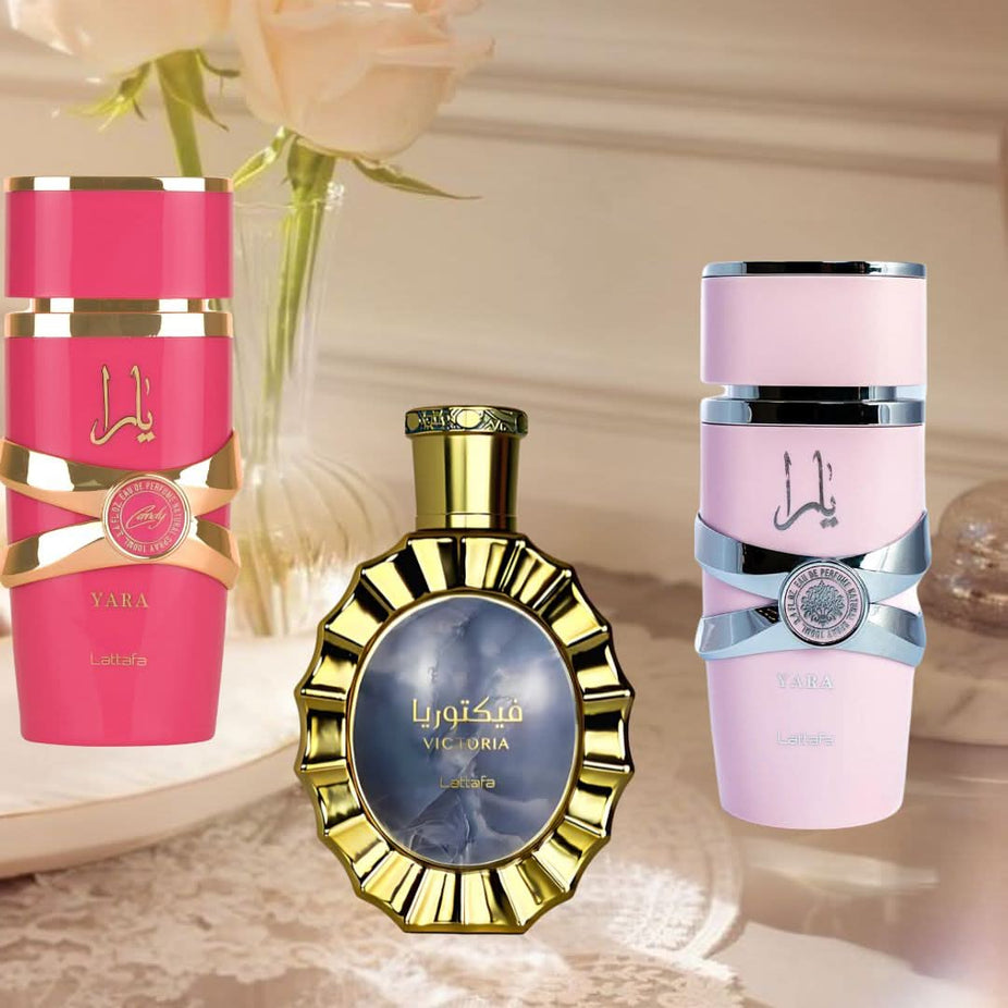 Lattafa Yara Candy and Victoria Eau de Parfum spray bundle, 100ml each, featuring colorful bottles in a stylish display.
