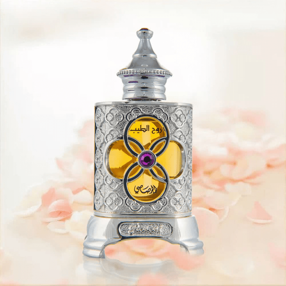 Ruh Al Teeb concentrated perfume oil by Rasasi in a 15ml bottle, featuring a luxurious floral and woody fragrance.
