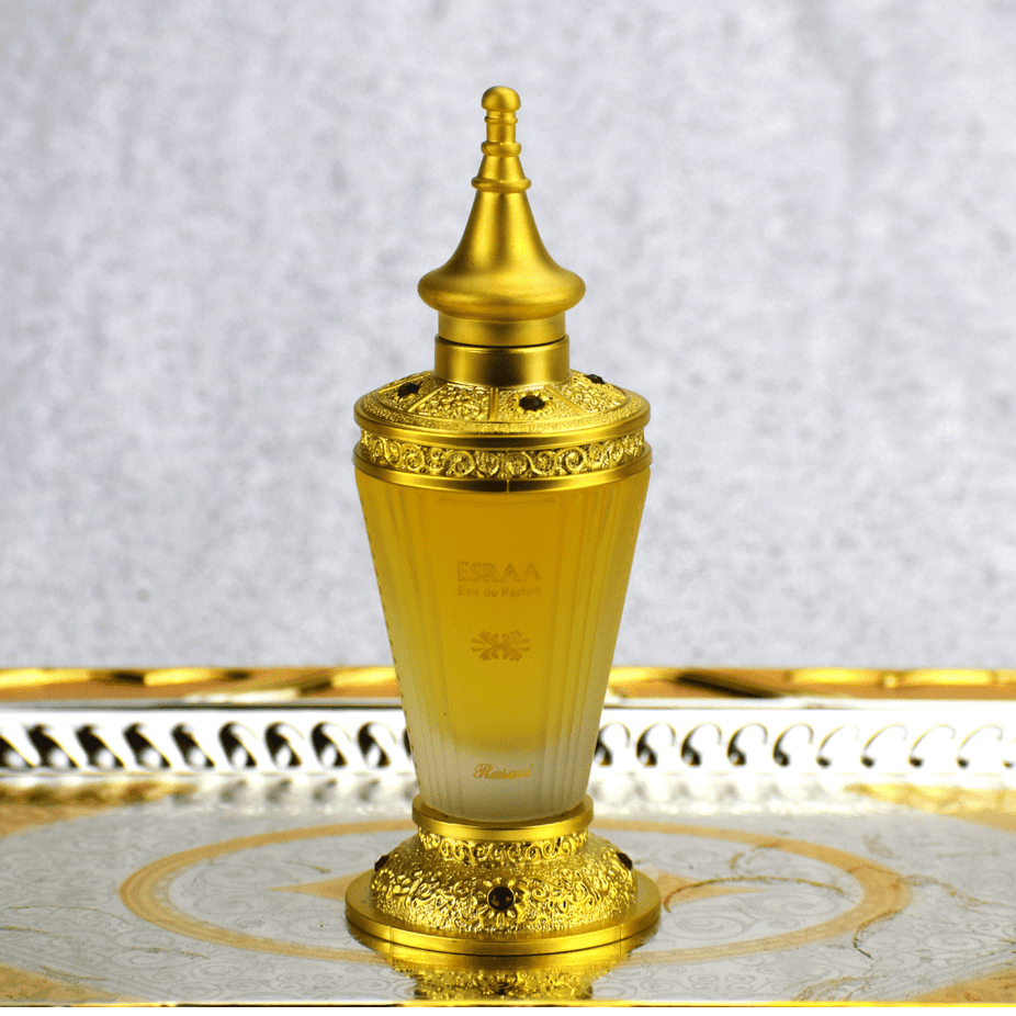 Esraa for Women Eau De Parfum by Rasasi, 60ml bottle, elegant floral fragrance with a sleek perfume bottle design.