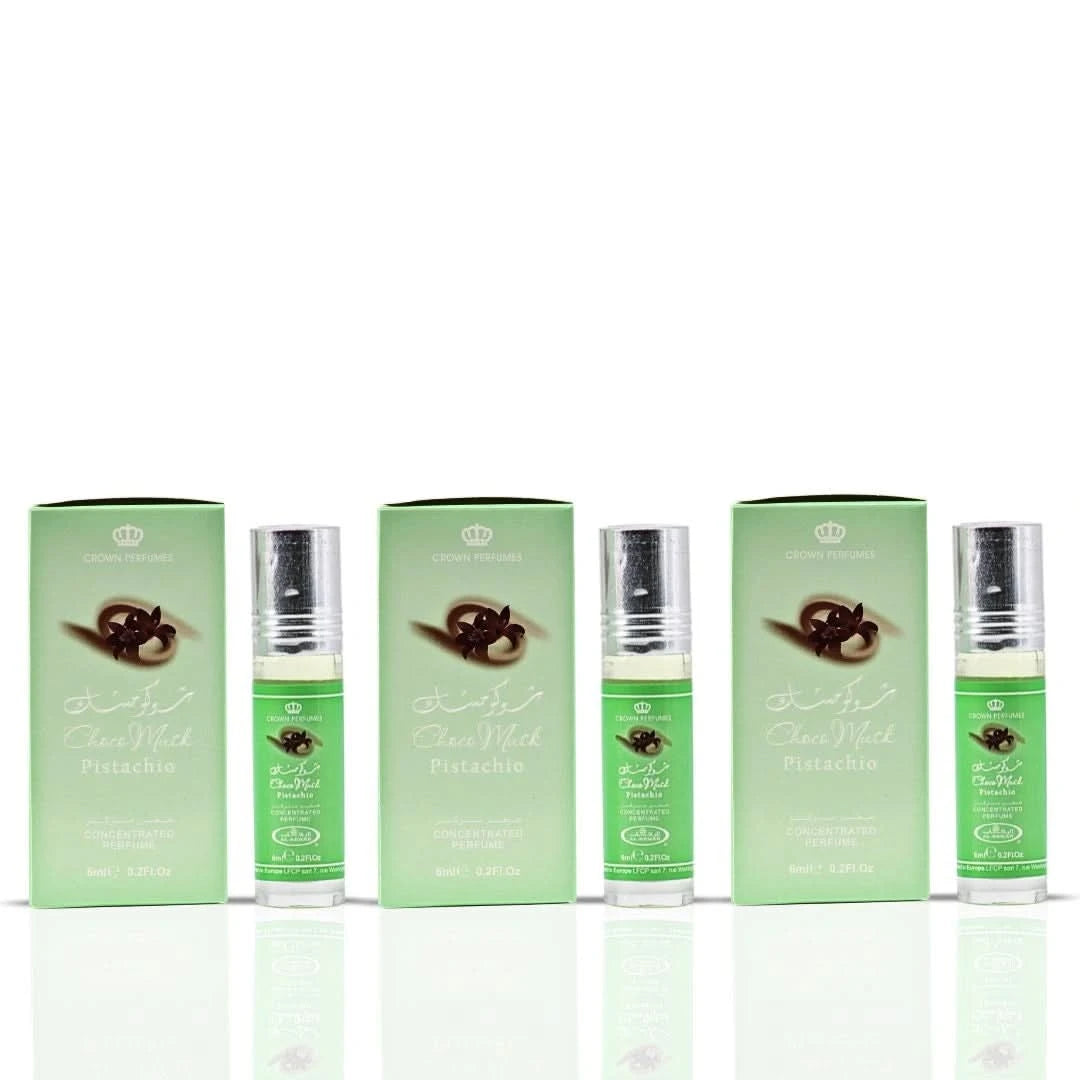 Al Rehab Choco Musk Pistachio perfume oil bundle with three 6ml bottles, featuring elegant packaging and dark-colored fragrance bottles.