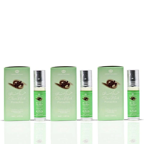 Al Rehab Choco Musk Pistachio perfume oil bundle with three 6ml bottles, featuring elegant packaging and dark-colored fragrance bottles.
