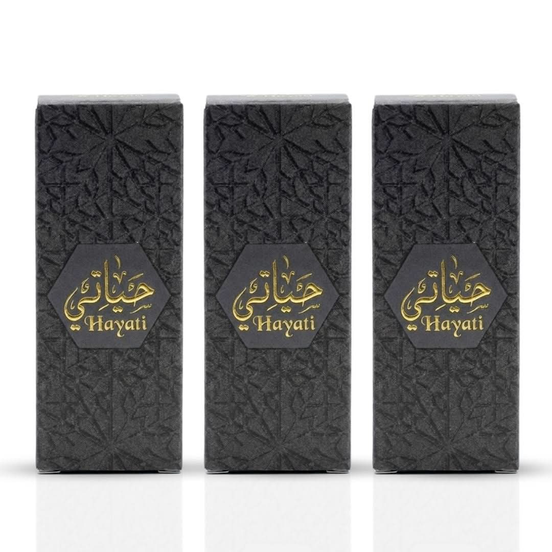 Al Haramain Hayati Concentrated Perfume Oil Set with four 3ml bottles and three refillable bottles, elegant and compact design.