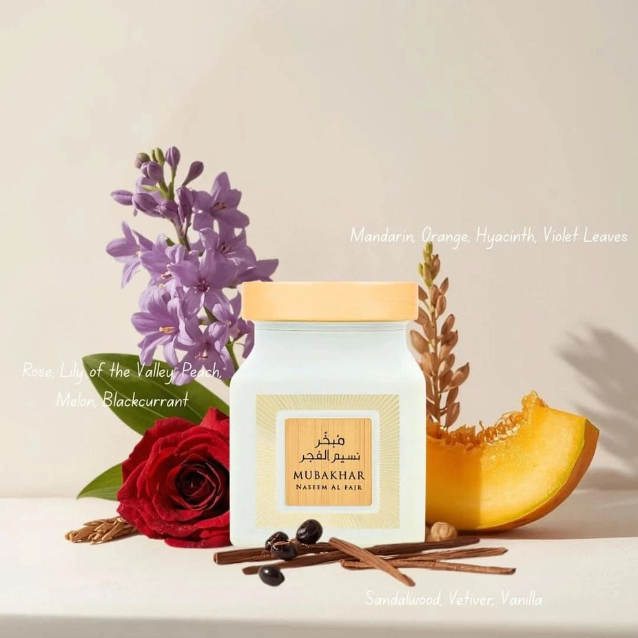 Rasasi Mubakhar Naseem Al Fajr Oudh Moattar Bakhoor 50g in a decorative container, used for traditional incense and aromatic home fragrance.