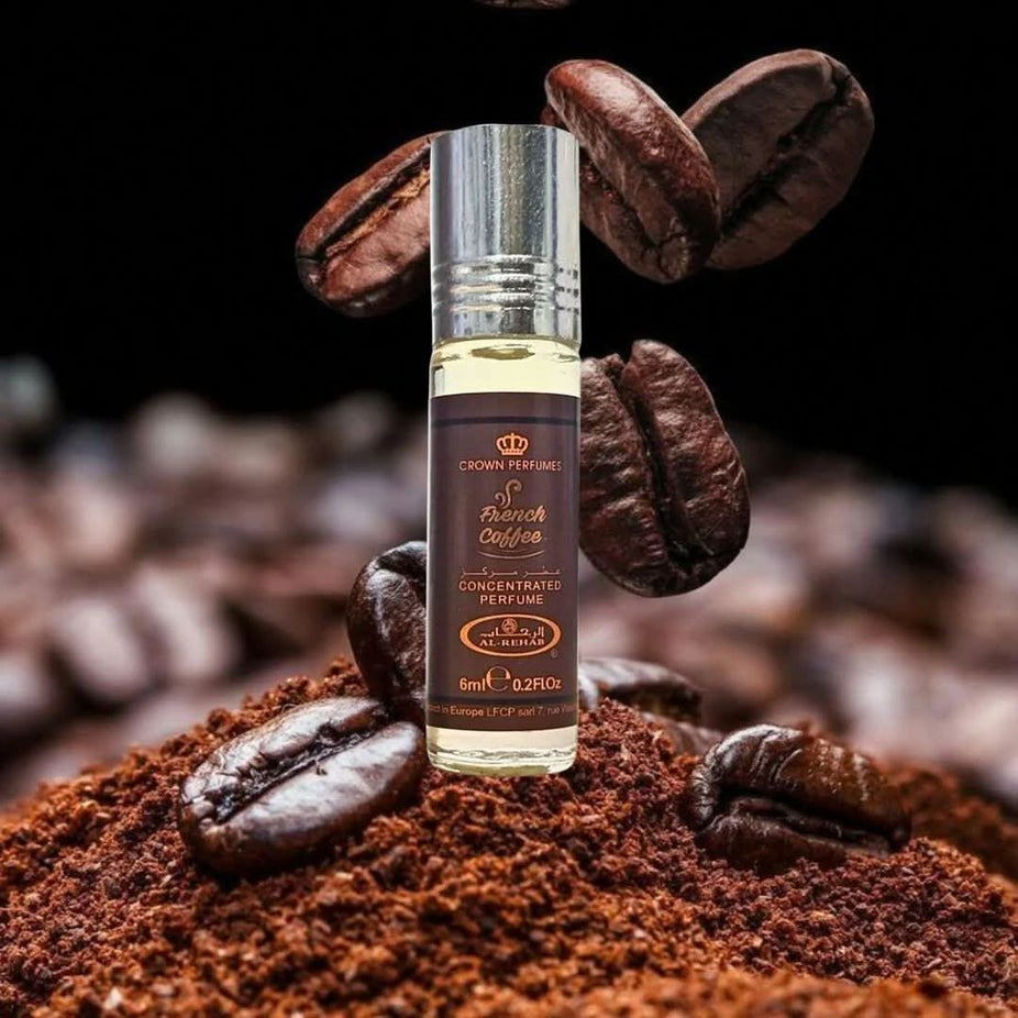 Bundle of Intense Oud Nebras Eau de Parfum spray 100ml and Al Rehab French Coffee perfume oil 6ml, featuring luxurious fragrance bottles.