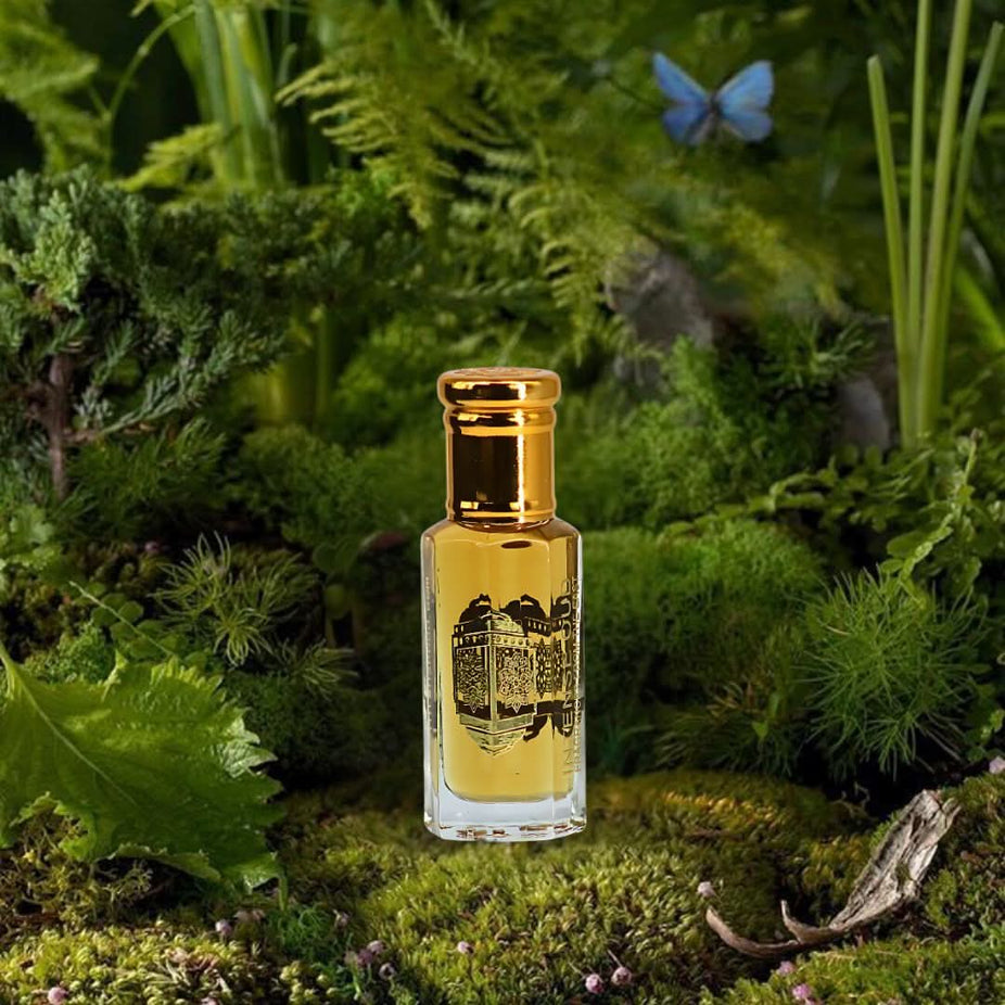Intense Oud Attar Full Men Perfume Oil in 12ml bottle with black gift box, featuring a clear glass bottle and black cap.