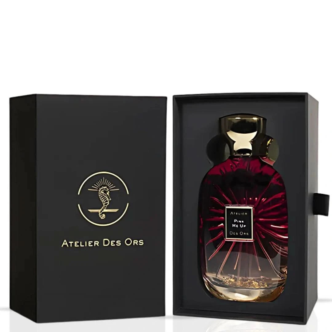 Pink Me Up Eau de Parfum spray by Atelier Des Ores in a pink bottle, showcasing the elegant fragrance packaging.
