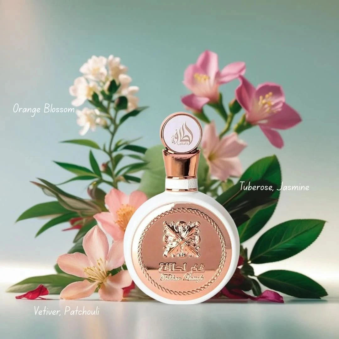 Lattafa Fakhar Women Eau de Parfum spray and all-over spray bundle, 100ml and 150ml bottles, with elegant packaging and floral design.