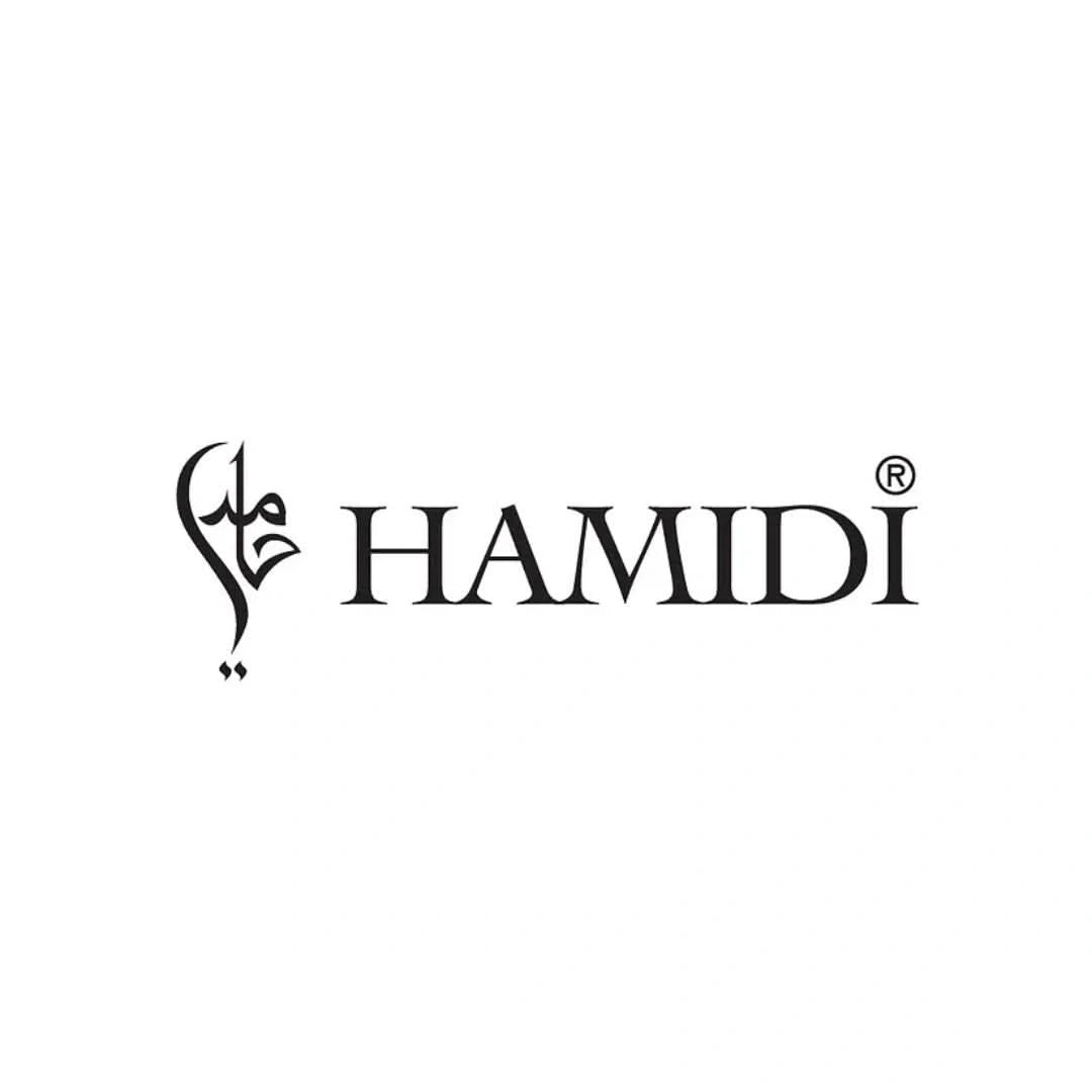 Hamidi Jawahir perfume oil CPO 12ml in velvet pouch, concentrated fragrance with elegant packaging and detailed branding.