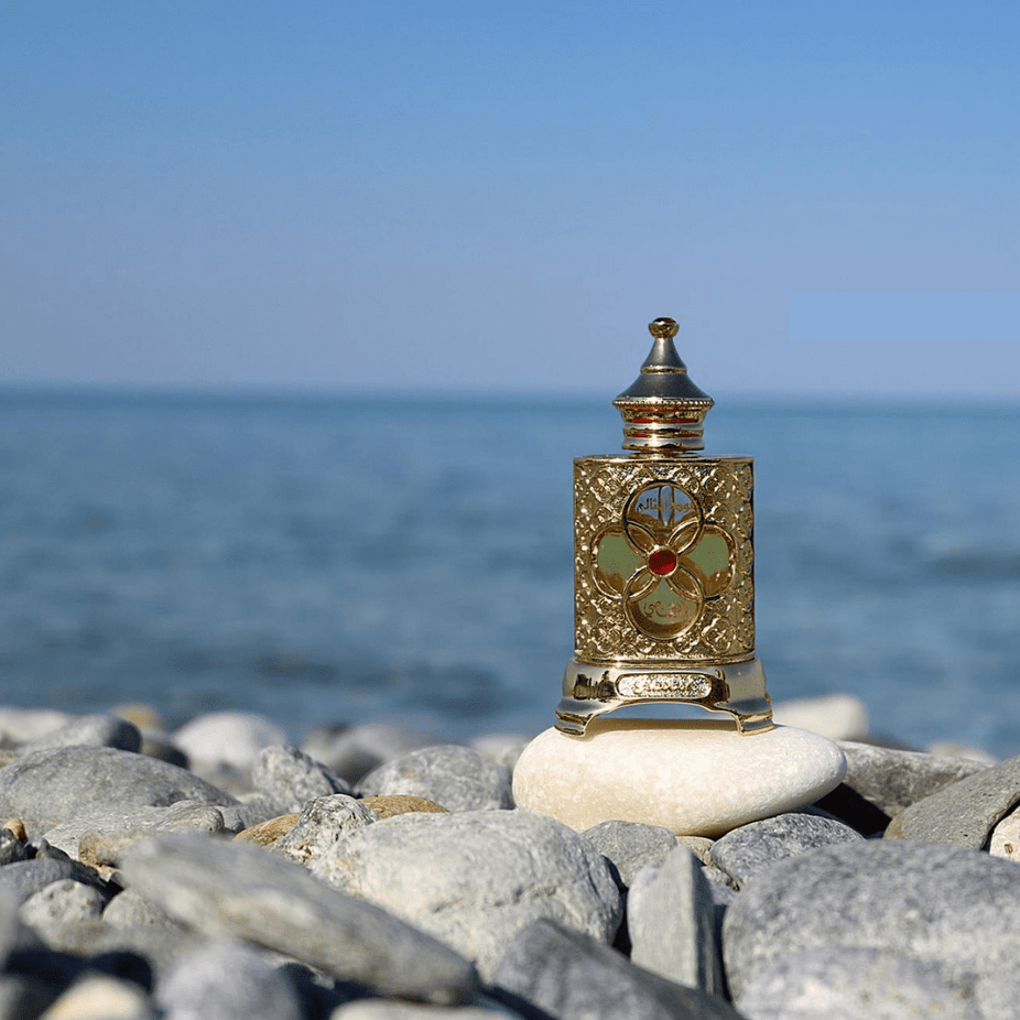 Rasasi Oudh Al Methali perfume oil bottle, 15 ML, focused on the dark glass container with a sleek cap.