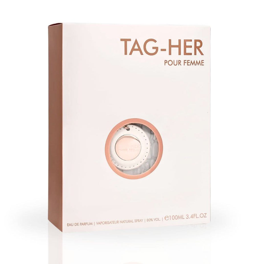 Armaf Tag Her Eau De Parfum spray bottle, 100ml, with elegant packaging and clear label, on a neutral background.
