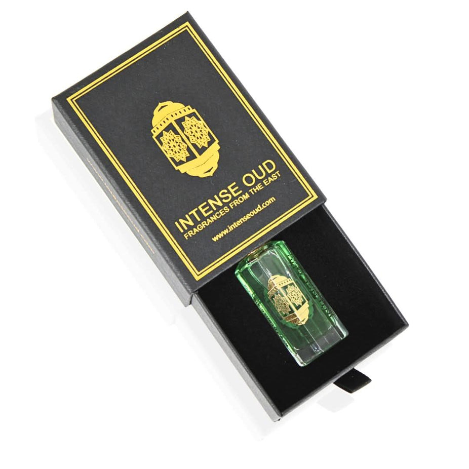 Fajr perfume oil by Intense Oud in 12ml glass bottle with black gift box, showcasing the luxurious loose oil product.
