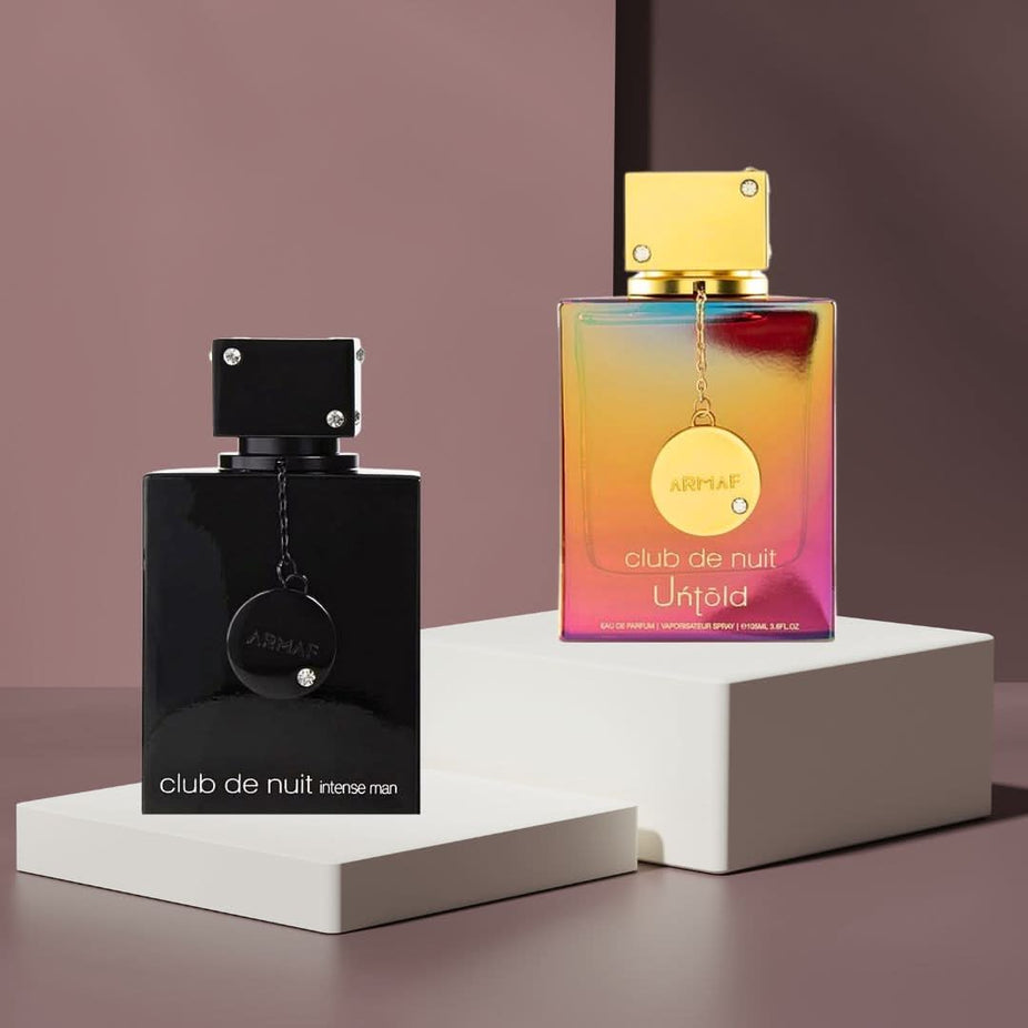 Armaf Club De Nuit Intense For Men EDT and Club De Nuit Untold EDP sprays bundle, 105ml each, with sleek bottle designs.