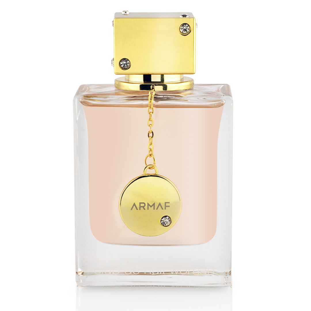 Armaf Club De Nuit for Women Eau de Parfum 105ml in a velvet pouch, featuring a floral and fruity fragrance bottle.