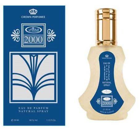 Al Rehab 2000 Eau De Parfum 35ml bottle with a sleek, clear glass design and a black cap, showcasing the fragrance's elegant packaging.