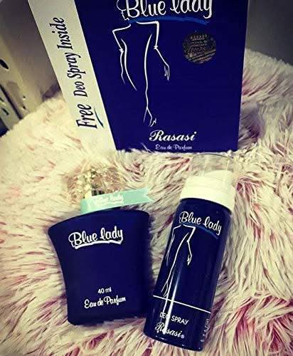 Rasasi couple set featuring a blue lady perfume and a blue men's deodorant bundle, showcasing sleek packaging and bottles.