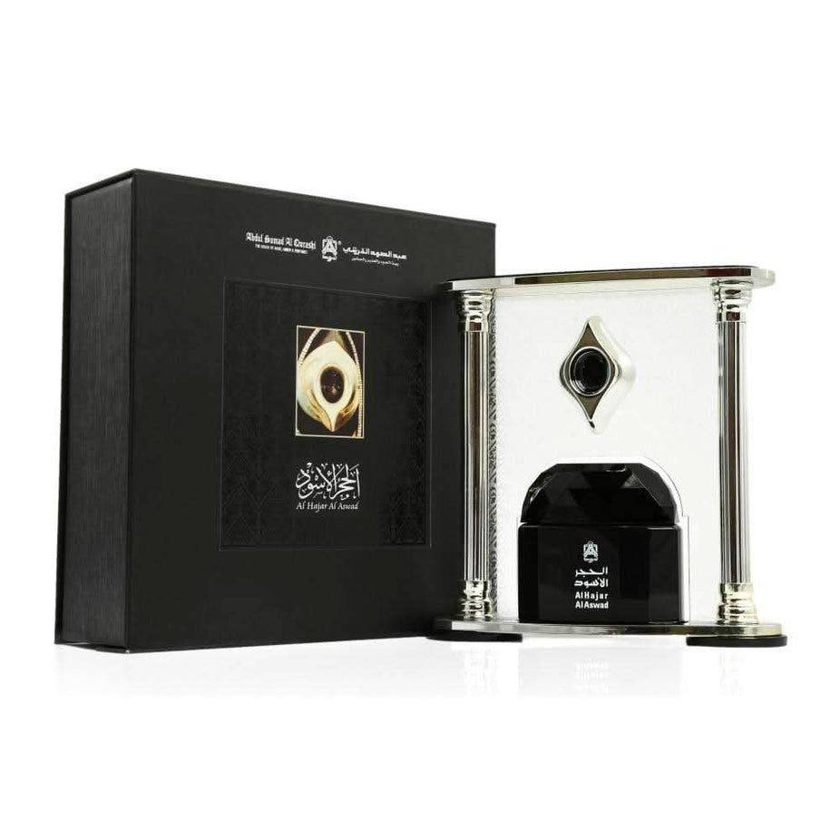 Al Hajar Al Aswad perfume oil by Abdul Samad Al Qurashi in 30ml CPO bottle, with elegant packaging and dark fragrance liquid.