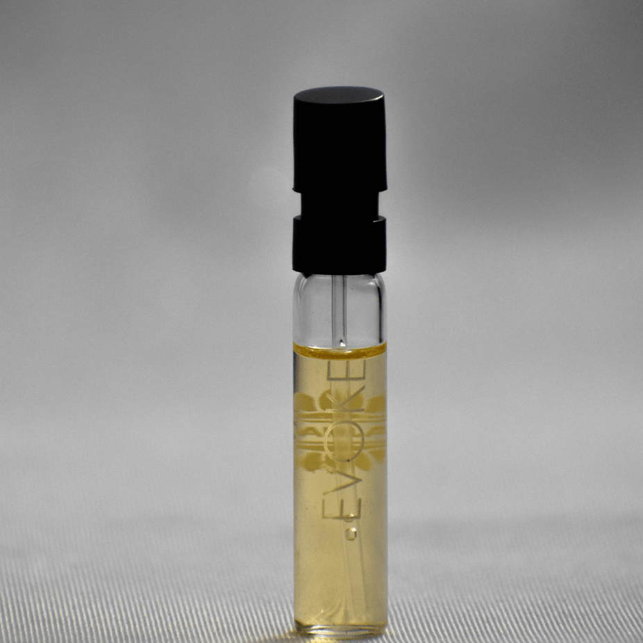 Evoke EDP sample for women by Ajmal, 1ml perfume vial showing the small glass bottle with fragrance liquid.