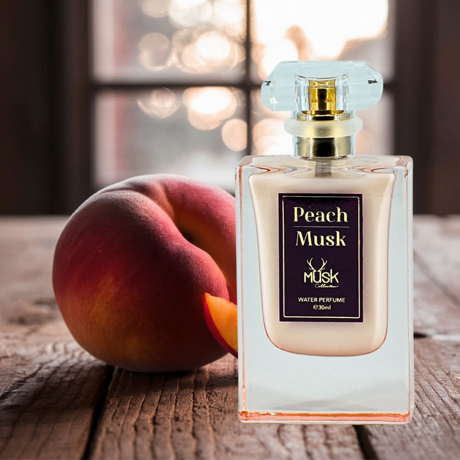 Hamidi Peach Musk Water Perfume spray bottle, 30ml, with elegant packaging and peach and musk scent visible in the image.