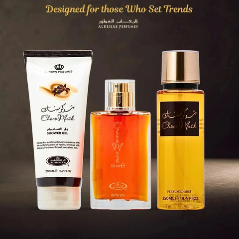 Al Rehab Choco Musk 3-piece perfume gift set with bottles of scented fragrances, elegant packaging, and decorative ribbons.