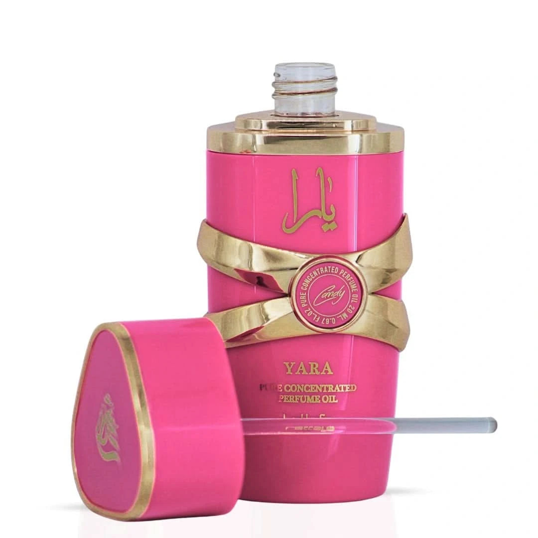 Lattafa Yara Candy Concentrated Perfume Oil 20ml in a velvet pouch, featuring a sleek glass bottle with a gold cap.