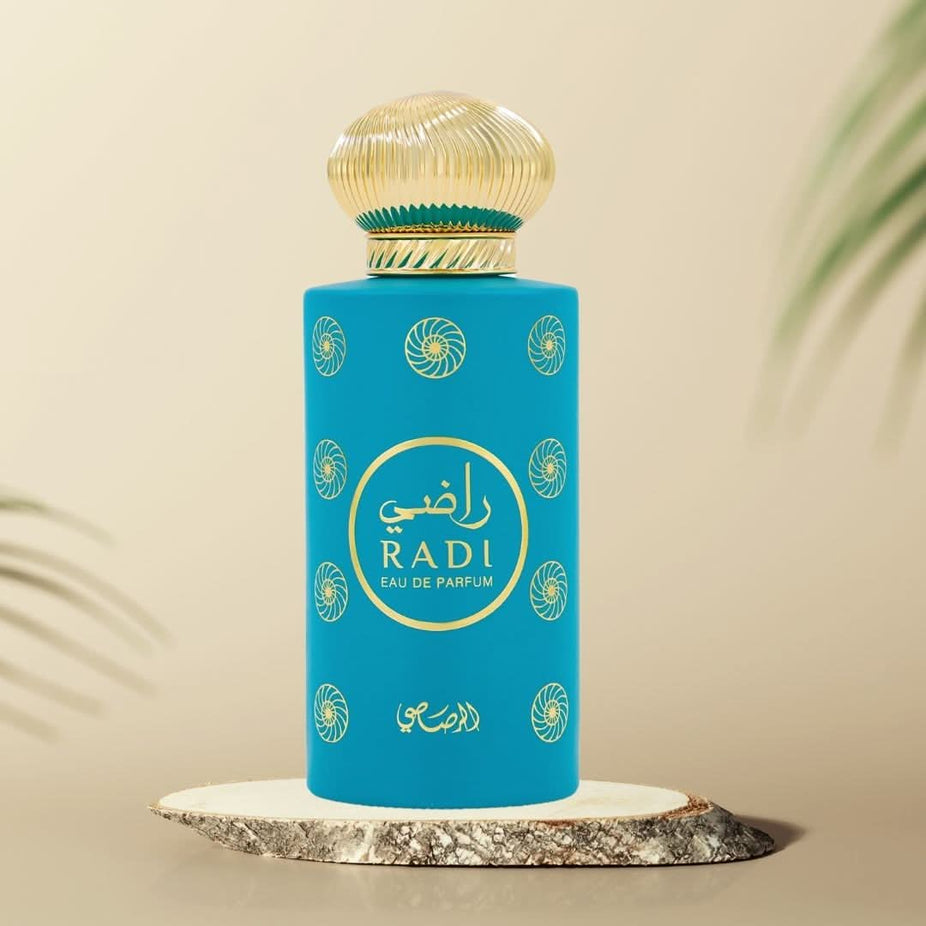 Rasasi Radi EDP Spray 100ML, a luxurious unisex fragrance with floral and fruity notes, long-lasting and refreshing.
