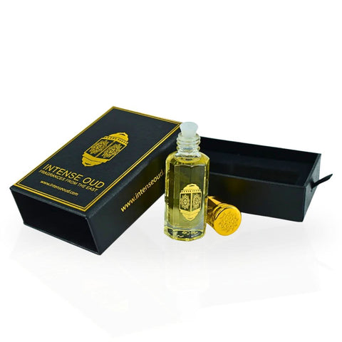 Intense Oud Mukhallat Al Najm perfume oil in 12ml clear bottle with black gift box, showcasing luxurious loose oil fragrance.