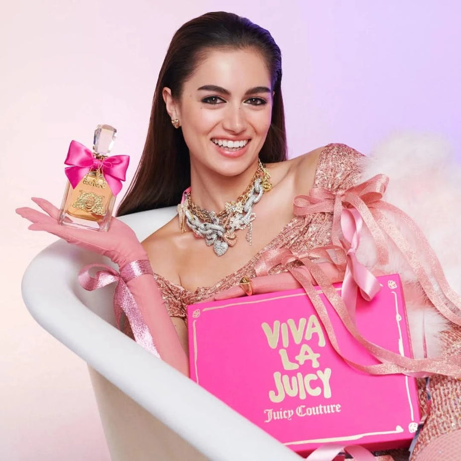 Viva La Juicy gift set with 1.7 oz and 0.33 oz Eau de Parfum bottles and 4.2 oz body souffle by Juicy Couture