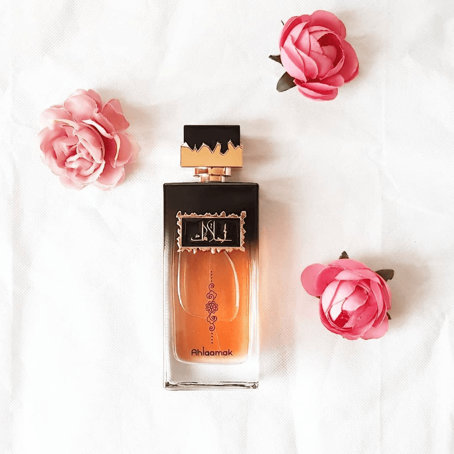 Ahlaamak Eau De Parfum 100ml bottle by Ard Al Zaafaran, elegant glass bottle with floral and oriental fragrance notes.
