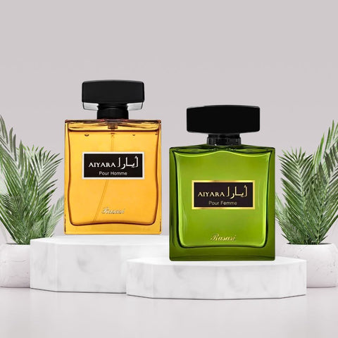 Rasasi Aiyara Pour Homme and Femme Eau de Parfum spray bundle, 100ml each, featuring sleek bottles with elegant fragrance designs.