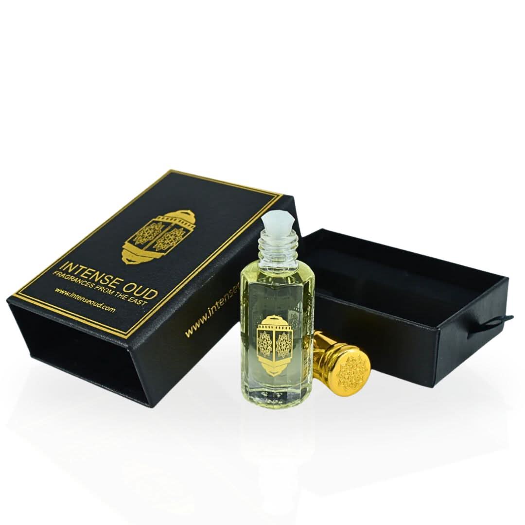 Intense Oud Emperor Perfume Oil 12ml in a black gift box, featuring a clear glass bottle with a black cap and elegant branding.