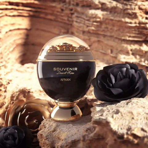 A bundle of Afnan Souvenir Blooming Bliss and Desert Rose Eau de Parfum sprays, 100ml each, showcasing elegant perfume bottles.