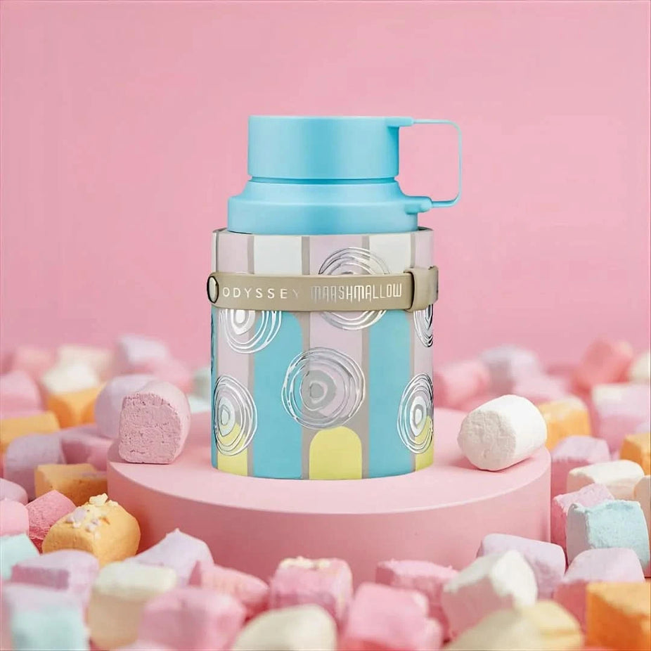 Odyssey Marshmallow Gourmand Edition Eau De Parfum spray by Armaf, 100ml, featuring a sleek bottle with a soft pink and gold design.