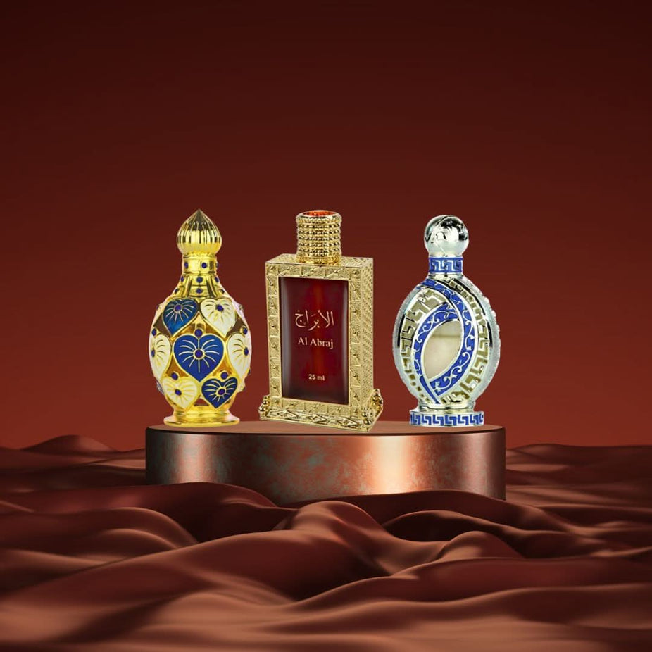 Hamidi Al Abraj Jawahir Iqra perfume oil collection with elegant bottles and decorative packaging.