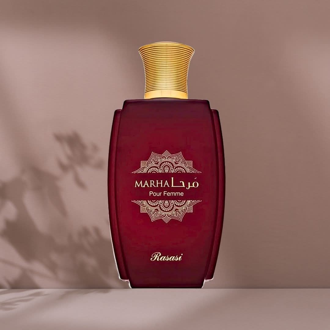 Rasasi Marha Pour Femme Eau de Parfum spray 100ml with elegant velvet pouch, showcasing the perfume bottle and packaging.