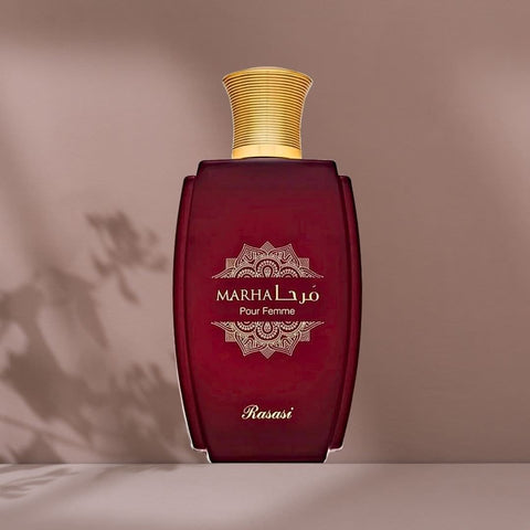 Rasasi Marha Pour Femme Eau de Parfum spray 100ml with elegant velvet pouch, showcasing the perfume bottle and packaging.